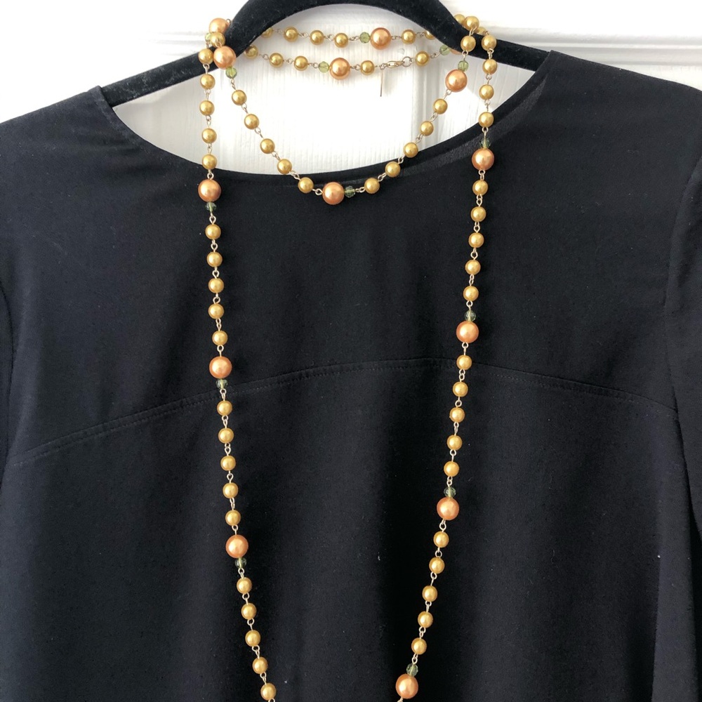 Long necklace - gold beading with pops of color